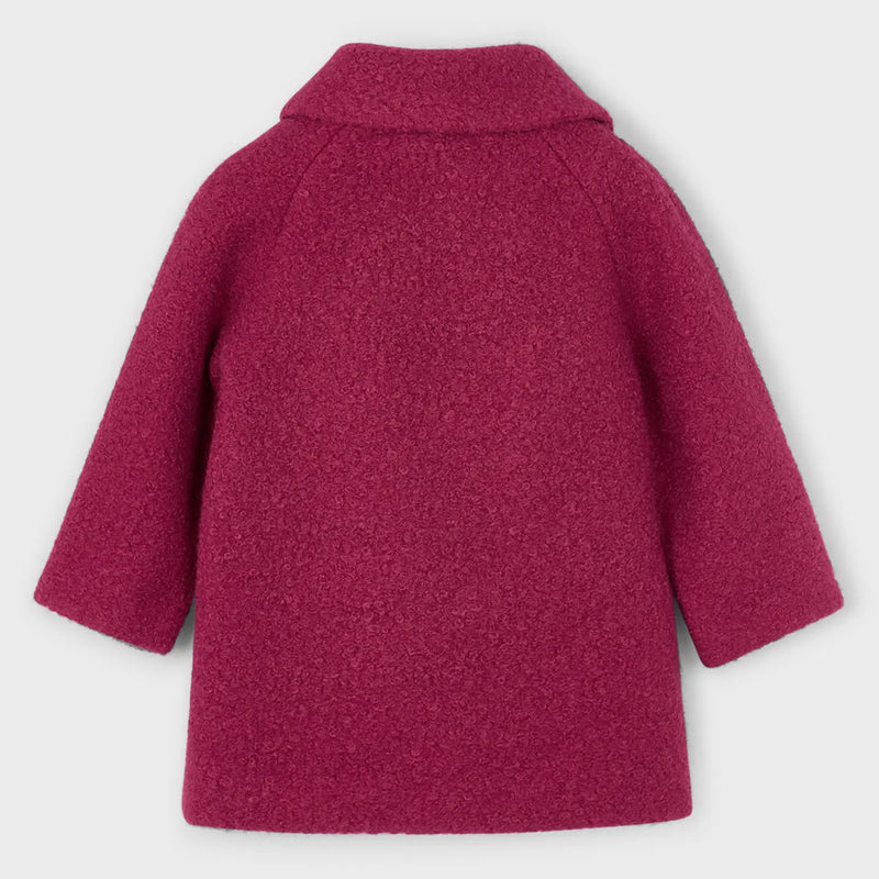 Back of the Mayoral red shearling coat.