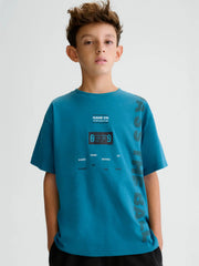 Boy wearing the Mayoral t-shirt.