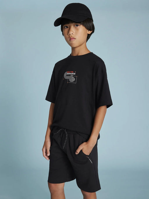 Boy wearing the Mayoral shorts set.