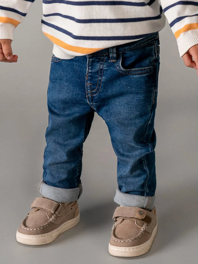 Closer view of the Mayoral skinny fit jeans.