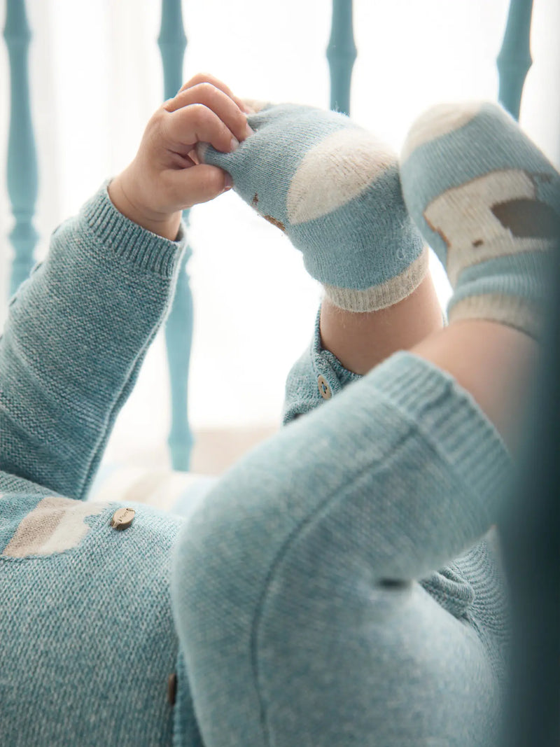 Baby boy wearing the Mayoral socks set.