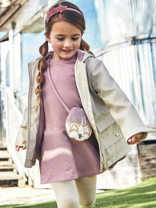 Girl modelling the Mayoral star dress.