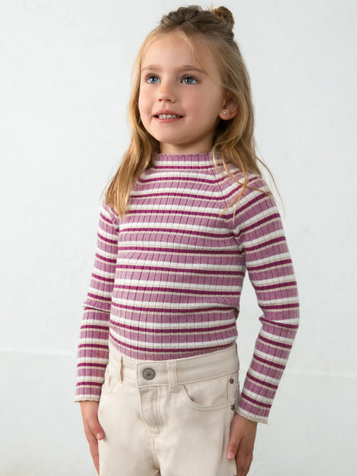 Smiling Girl modelling the Mayoral striped jumper.