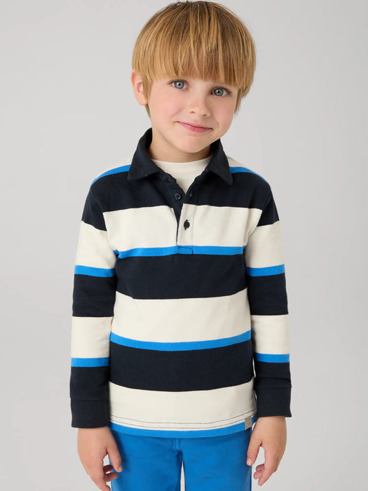 Boy modelling the Mayoral striped polo shirt.