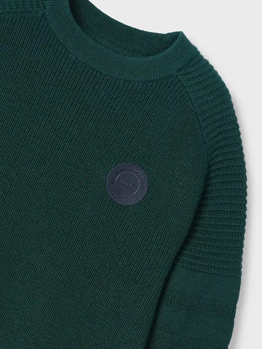 Mayoral sweater with logo patch on the chest.