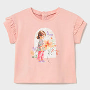 Baby girl's peach pink t-shirt.