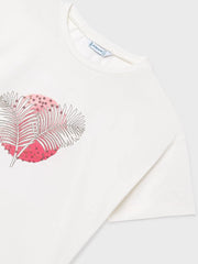 Girl's white t-shirt with palm leaf print.