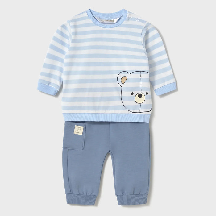 Baby boy's tracksuit with blue and white striped top.