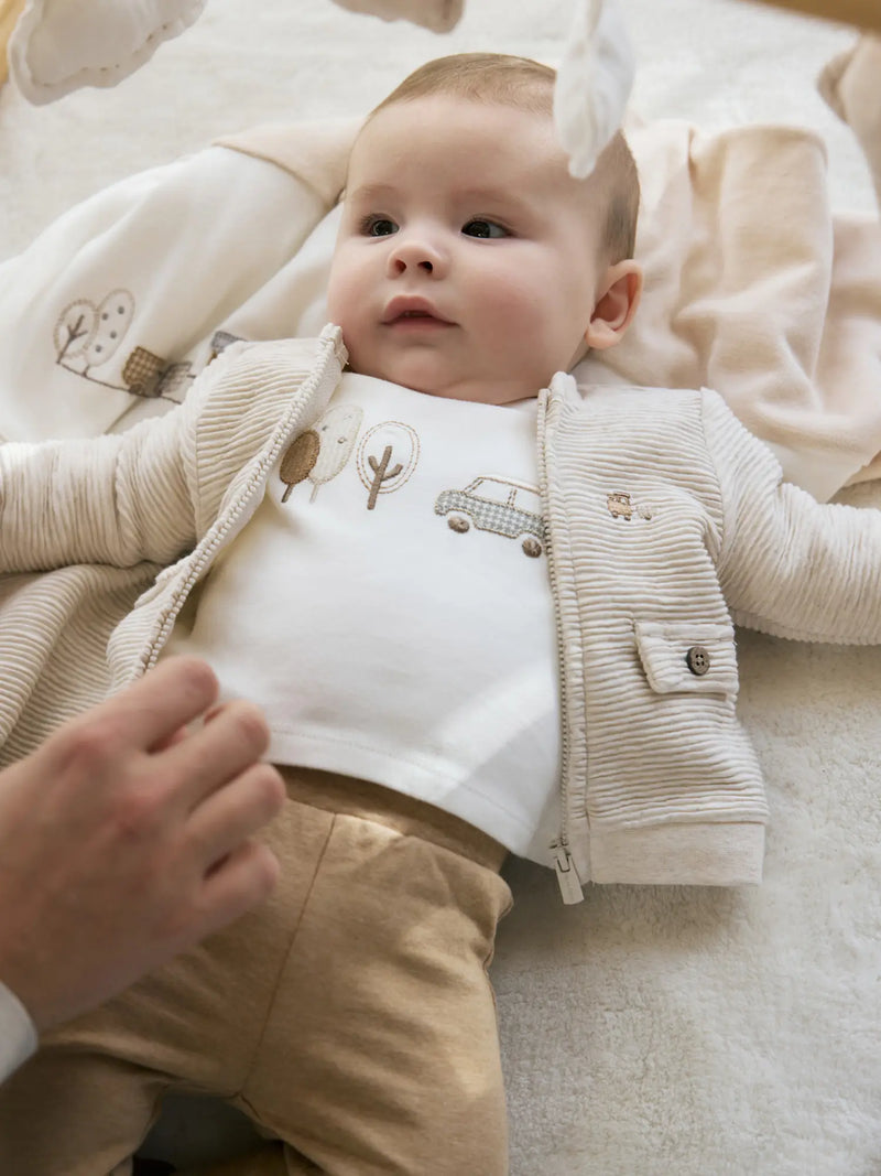 Baby boy wearing the Mayoral tracksuit.