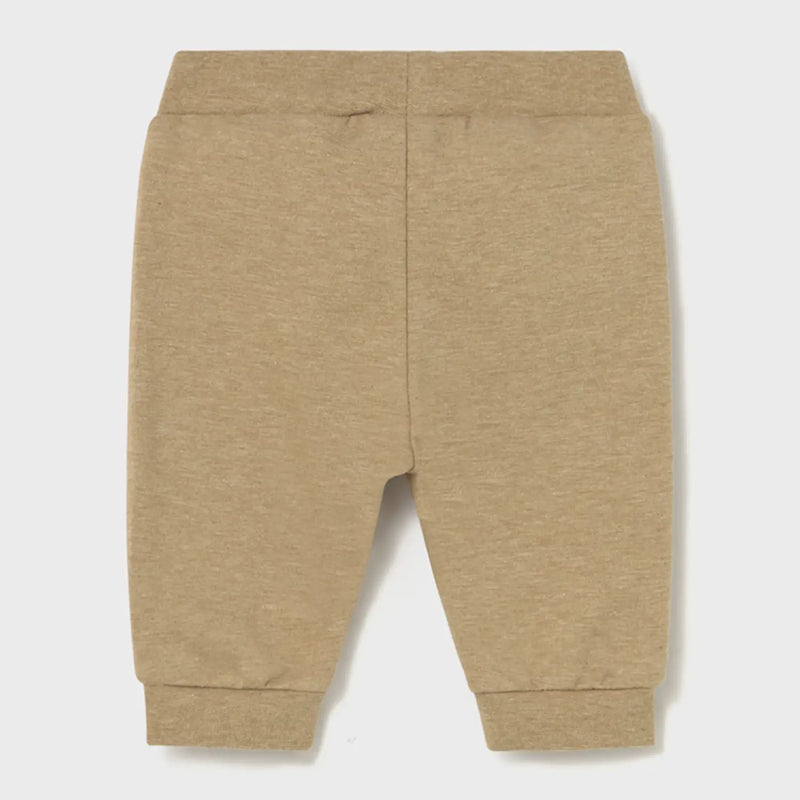 Newborn boy's toffee brown track bottoms.