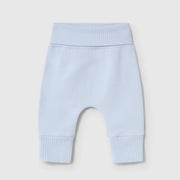 Newborn boy's pale blue bottoms.