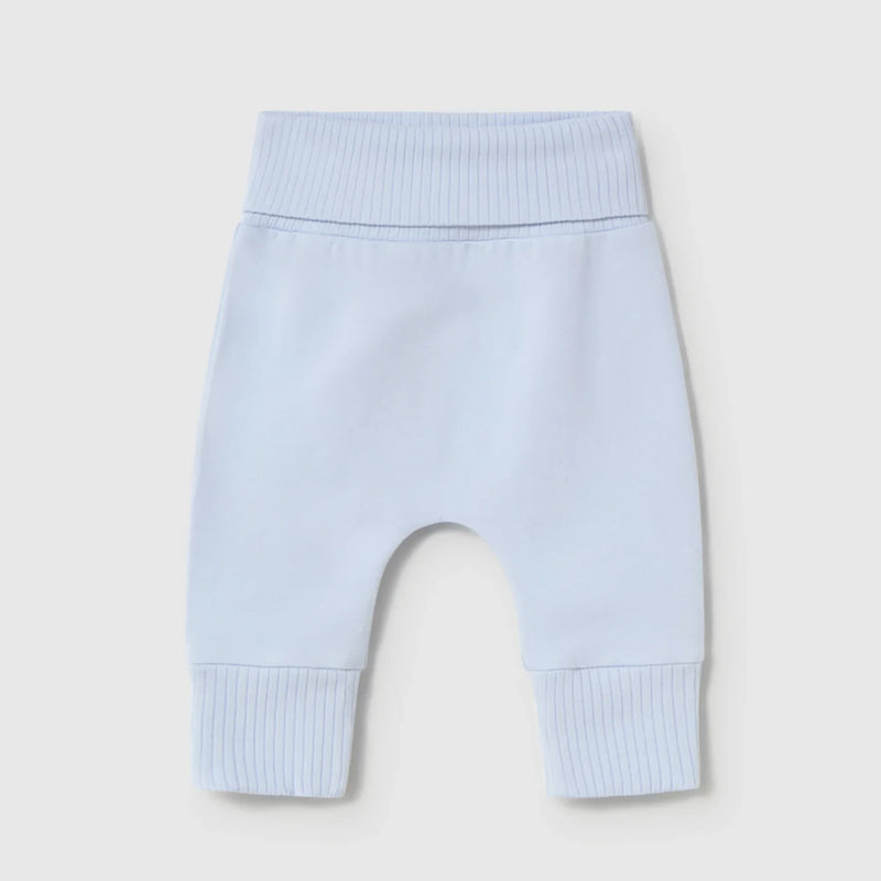 Newborn boy's pale blue bottoms.
