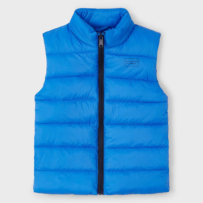 Boy's bright blue padded gilet.