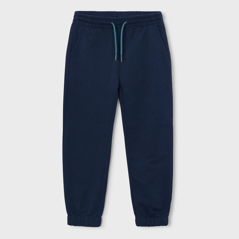Boy's navy blue track bottoms.
