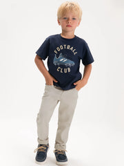 Boy wearing the Mayoral trousers.