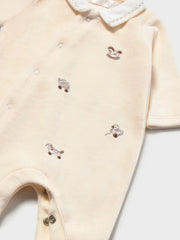 Closer view of the Mayoral velour babygrow.