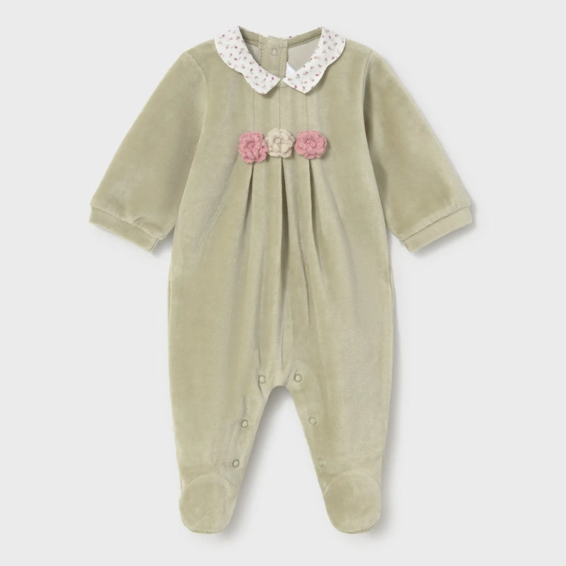 Mayoral green velour babygrow with crocheted flowers on the chest.