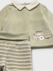 Closer look at the Mayoral velour leg warmer showing detail of the embroidered tractor design.