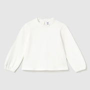 White long sleeve top with frilled neckline.
