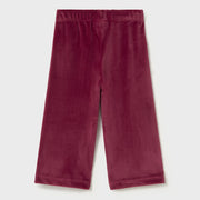 Raspberry pink velour trousers.