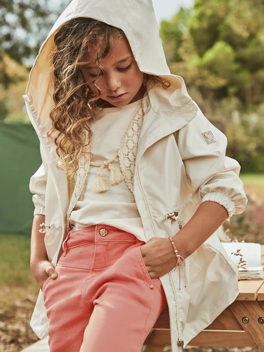 Girl modelling the Mayoral windbreaker.