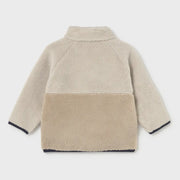 Rear view of the Mayoral beige zip up fleece.