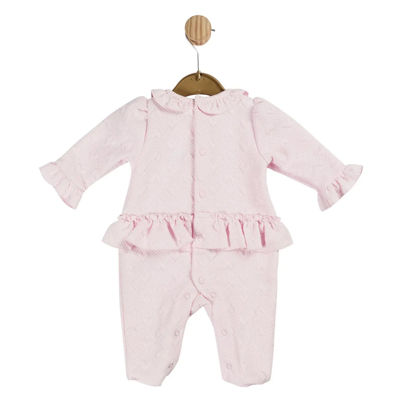 Back of the Mintini Baby girl's frilled babygrow.