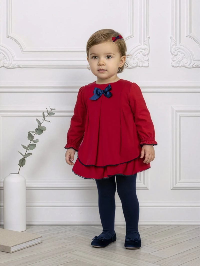 Miranda bow dress, modelled by baby girl.