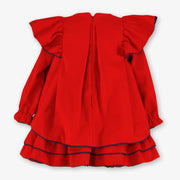 Rear view of the Miranda red bow dress.