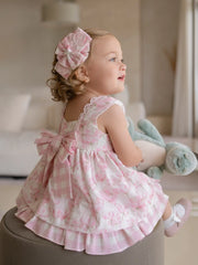 Closer look at the Miranda floral print dress showing detail of the large gingham bow on the back.