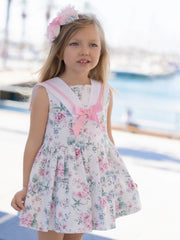 Girl modelling the Miranda floral print dress.