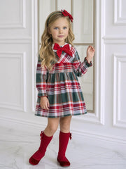 Girl modelling the Miranda plaid dress.