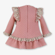 Rear view of the Miranda pink quilted dress.