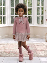 Girl modelling the Miranda quilted dress.