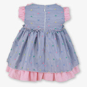 Rear view of the Miranda blue striped dress.