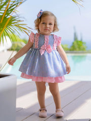 Baby girl modelling the Miranda striped dress.