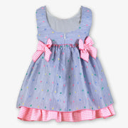 Rear view of the Miranda blue striped dress.