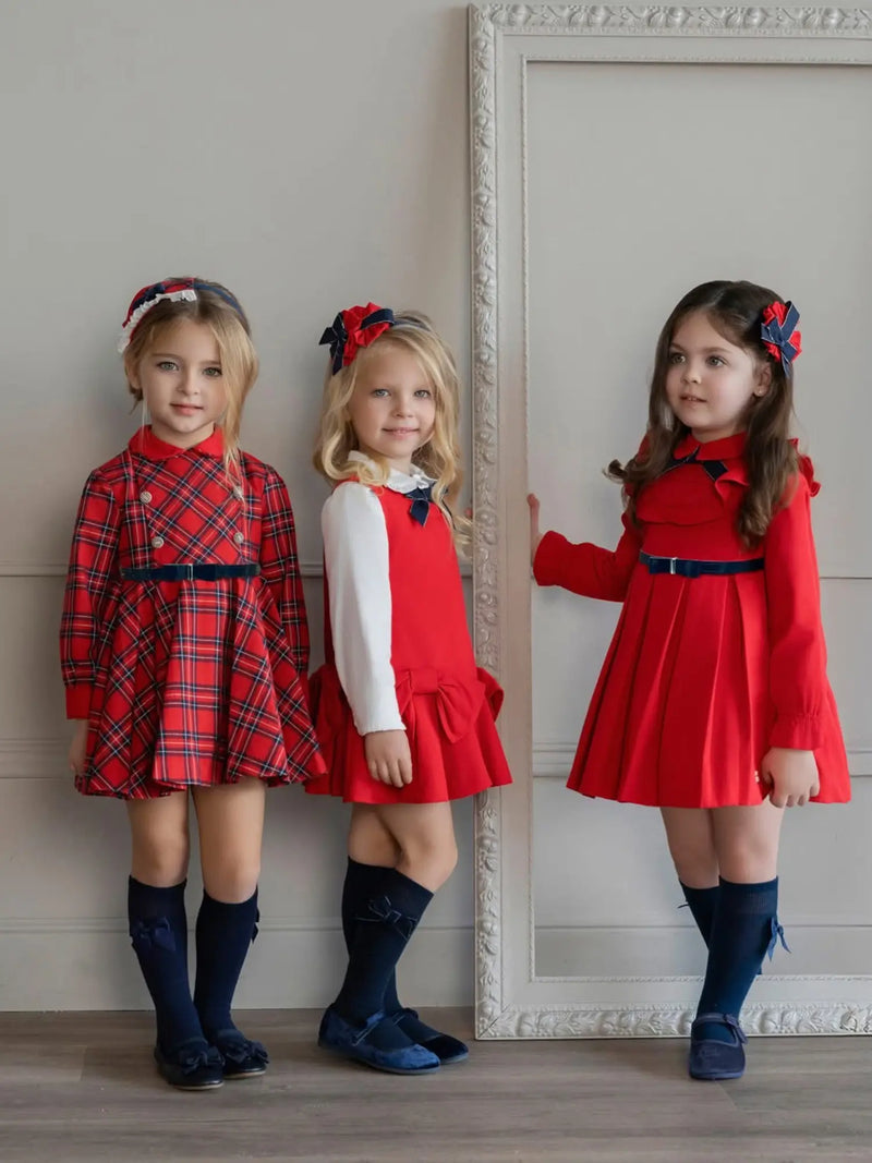 Girl modelling the Miranda tartan dress.
