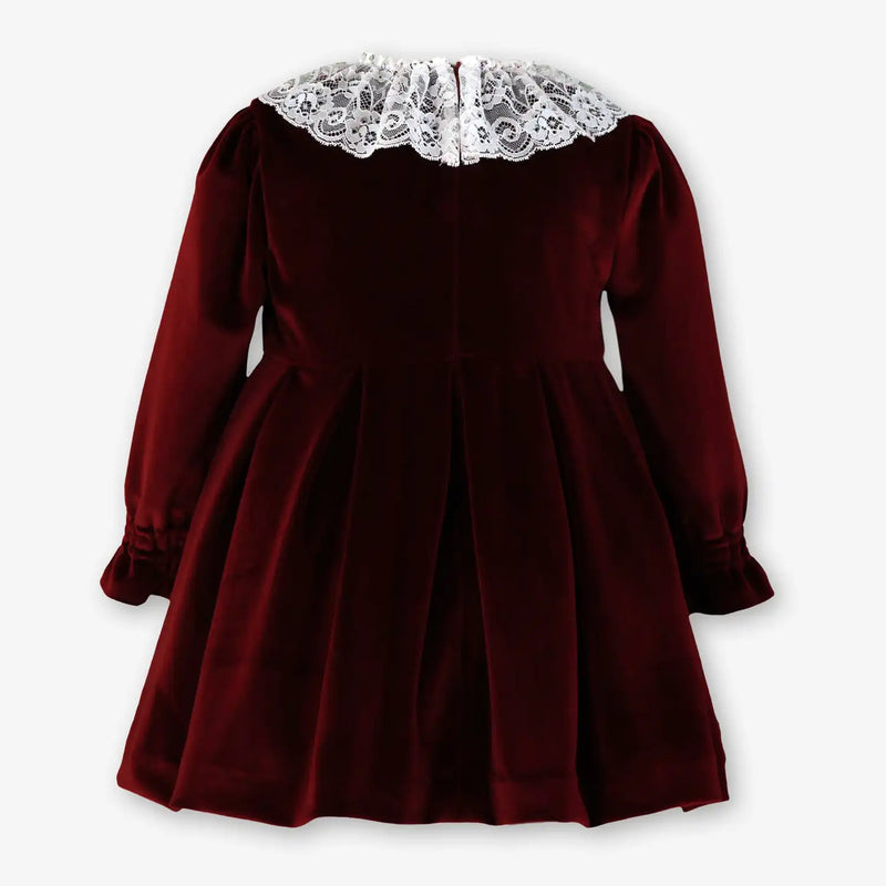 Rear view of the Miranda burgundy velvet dress.