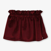 Girl's rich burgundy velvet skirt.