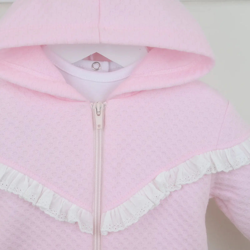 Closer look at the Pex bianca tracksuit showing detail of the white broderie trim.