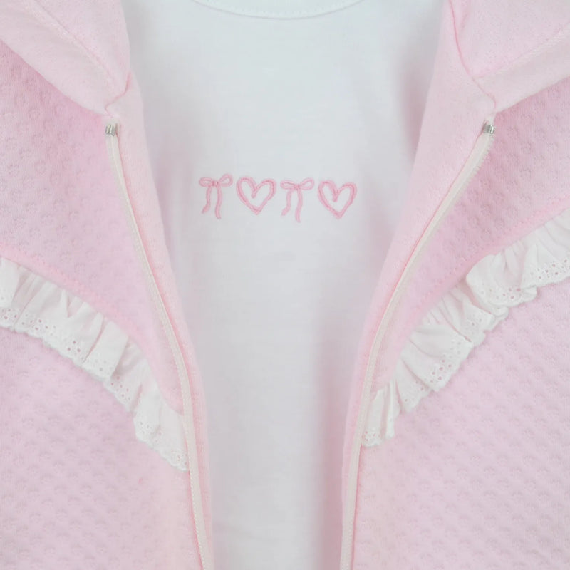 Closer view at the Pex bianca t-shirt with pink embroidered hearts and bows.