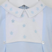 Closer look at the Pex derry leg warmer set showing detail of the blue embroidered stars.