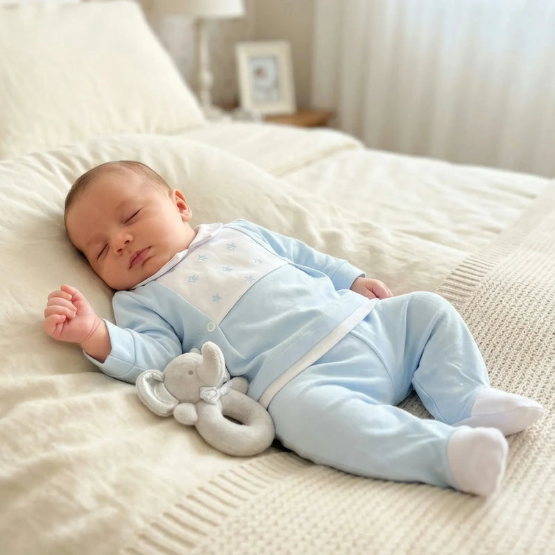 Sleeping baby boy wearing the Pex derry leg warmer set.