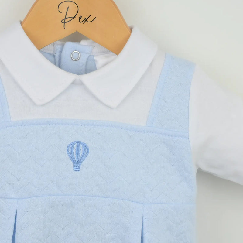 Closer look at the Pex pascal babygrow showing detail of the embroidered hot air balloon.