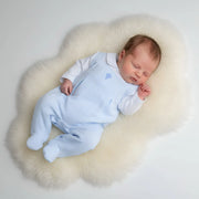 Baby boy wearing the Pex pascal babygrow.