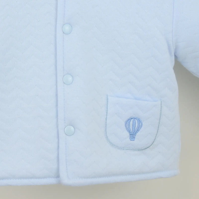 Pex pascal jacket with embroidered hot air balloon on the pocket.