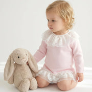 Baby girl wearing the Pex sadie dress.