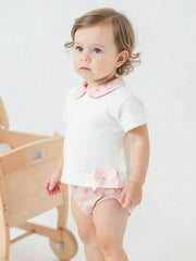 Baby girl wearing the Pex sophia romper.