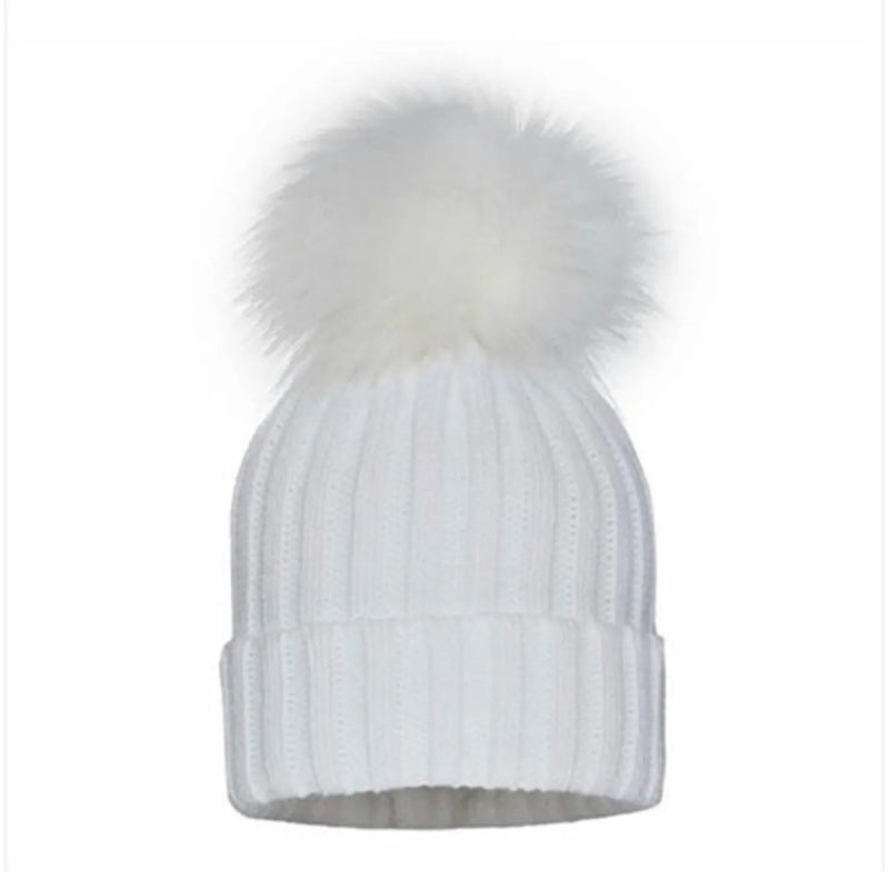Pom Pom Envy white single dream hat.
